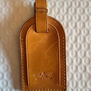 Louis Vuitton leather bag tag